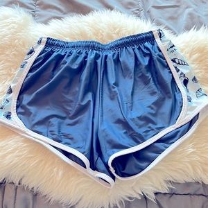 Krass & Co blue seashell running shorts